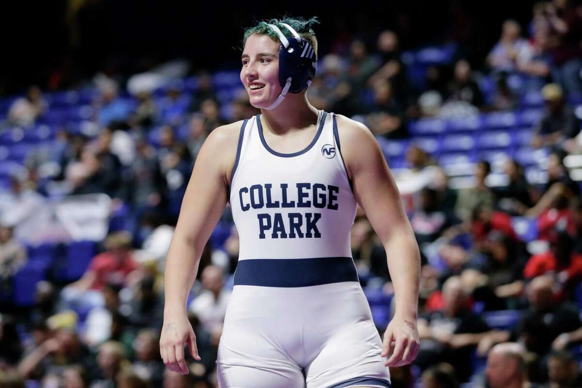 Maddie Welch of College Park reacts after winning the Girls 6A 215 weight class match during the UIL state wrestling championship tournament Saturday, Feb. 19, 2022 in Cypress, TX.