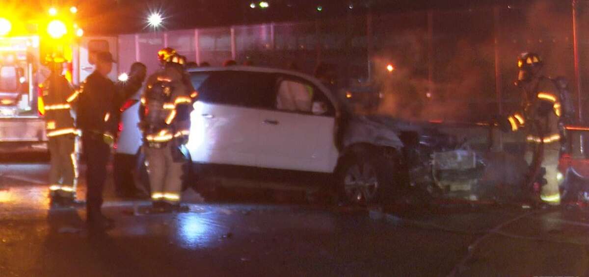 A driver was crushed and killed in a fiery crash involving an SUV and an 18-wheeler on the Houston ship channel bridge early Sunday morning, according to police.