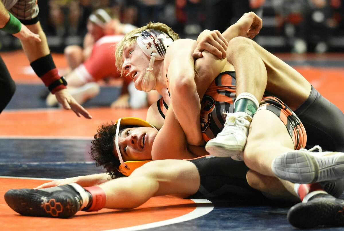 Edwardsville's Dylan Gvillo in action during his fifth-place match of the 138-pound bracket at the Class 3A state tournament on Saturday in Champaign.
