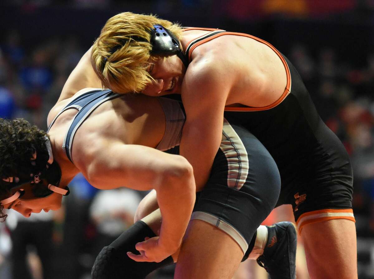Edwardsville's Drew Landau in action during his fifth-place match of the 145-pound bracket at the Class 3A state tournament on Saturday in Champaign.