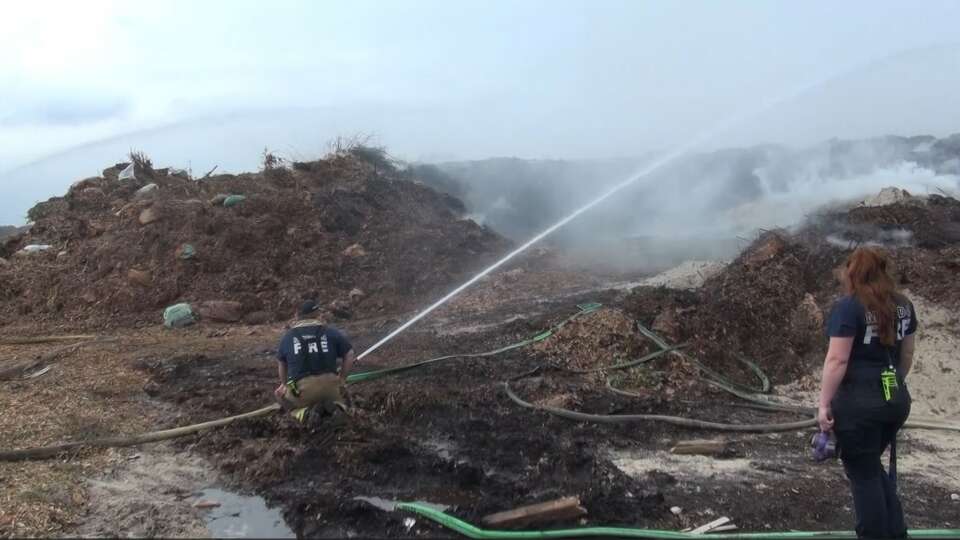 Authorities work to put out a mulch fire in Montgomery County.  