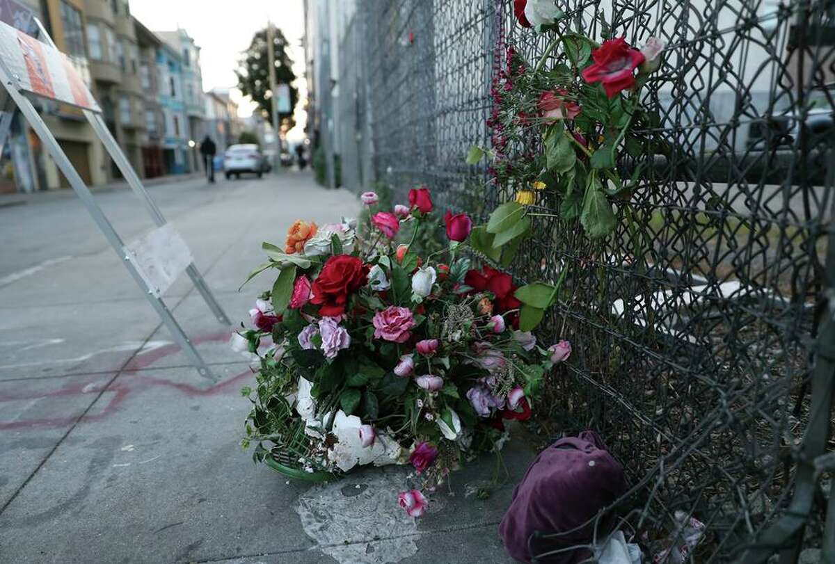 Flowers are seen Sunday on the 600 block of Minna Street in San Francisco, where a 16-year-old girl was found dead Friday.