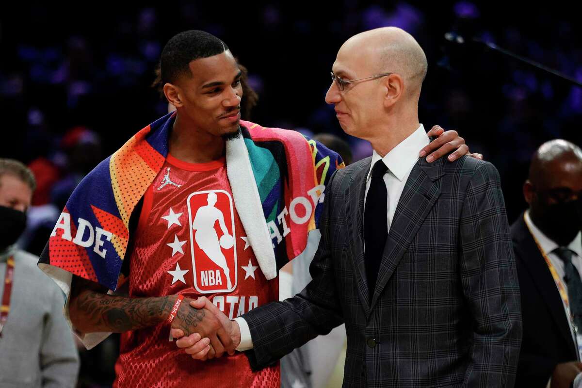 Dejounte Murray #5 of Team Durant shakes hands with NBA Commissioner Adam Silver during the 2022 NBA All-Star Game at Rocket Mortgage Fieldhouse on February 20, 2022 in Cleveland, Ohio.