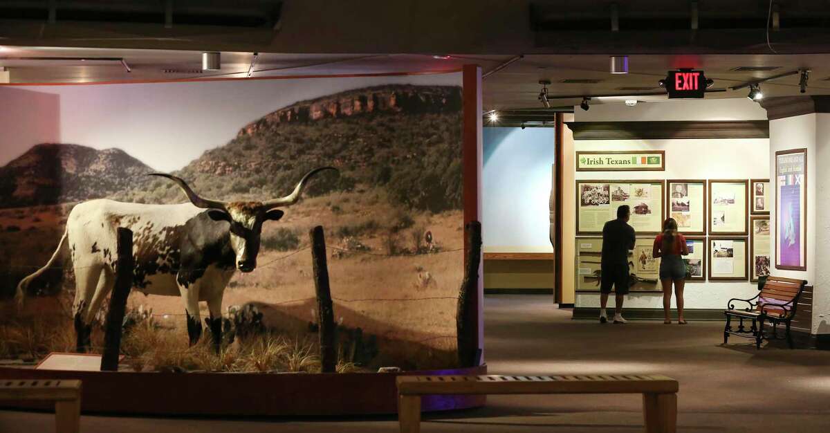 Visitors view exhibits at the Institute of Texan Cultures on Sept. 16, 2021, the first day the museum was open after closing due to the coronavirus pandemic in 2020.