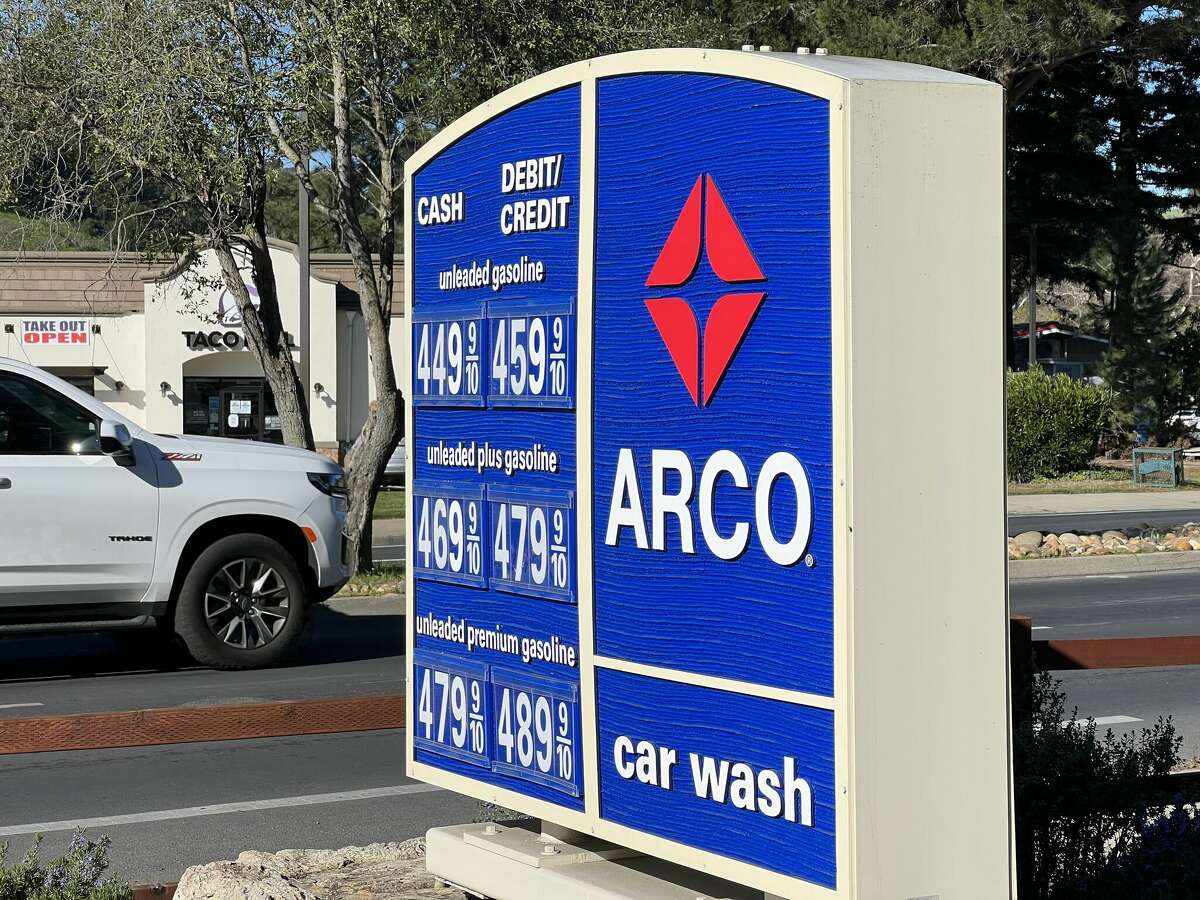 Sign with gas prices at an Arco gas station in Moraga, Calif., Jan. 30, 2022.