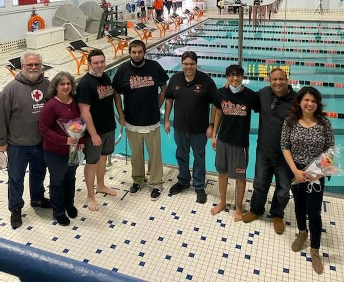 Jai Goel and Matt Marty were honored on Senior Night. Pictured are Matt’s parents Greg and Loretta Marty, Shelton coach Tom Jurzynski, assistant coach Jamey Allan, Goel and his parents Prashant and Neetu.