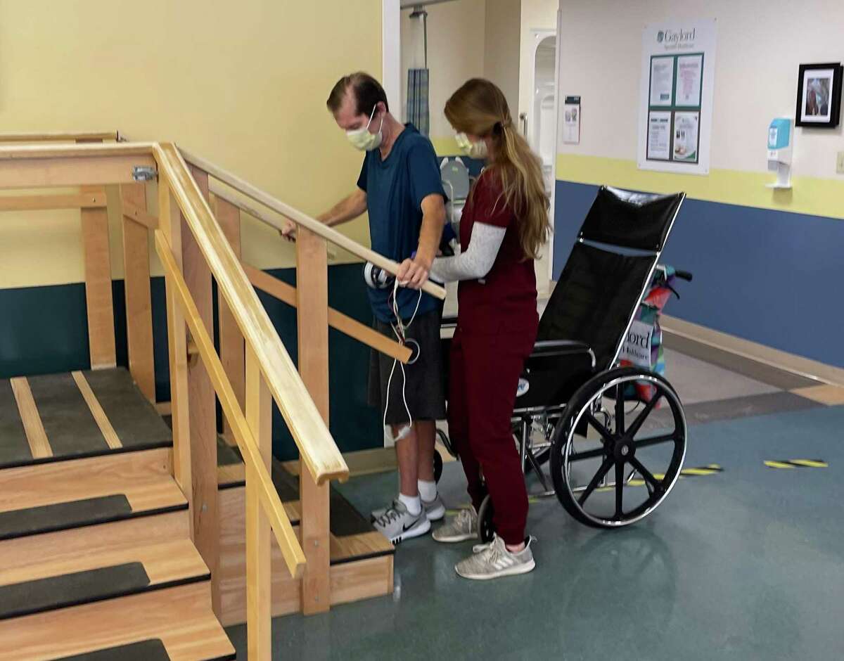 COVID-19 patient Chris Stephenson reached an important rehabilitation milestone recently when he was able to climb stairs at Gaylord Specialty Healthcare in Wallingford.