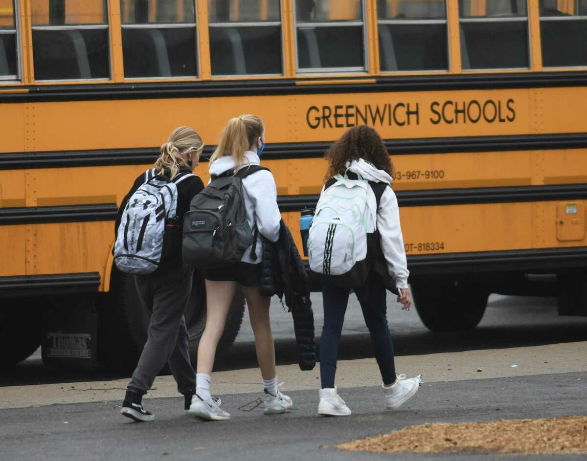 Students are discharged on the first day of their return to Central Middle School in Greenwich, Connecticut on Tuesday, Feb. 22, 2022. Concerns about the structural integrity of the building have forced students to travel to other schools more earlier this month, but the issue has been resolved and students are now back at Central Middle School.