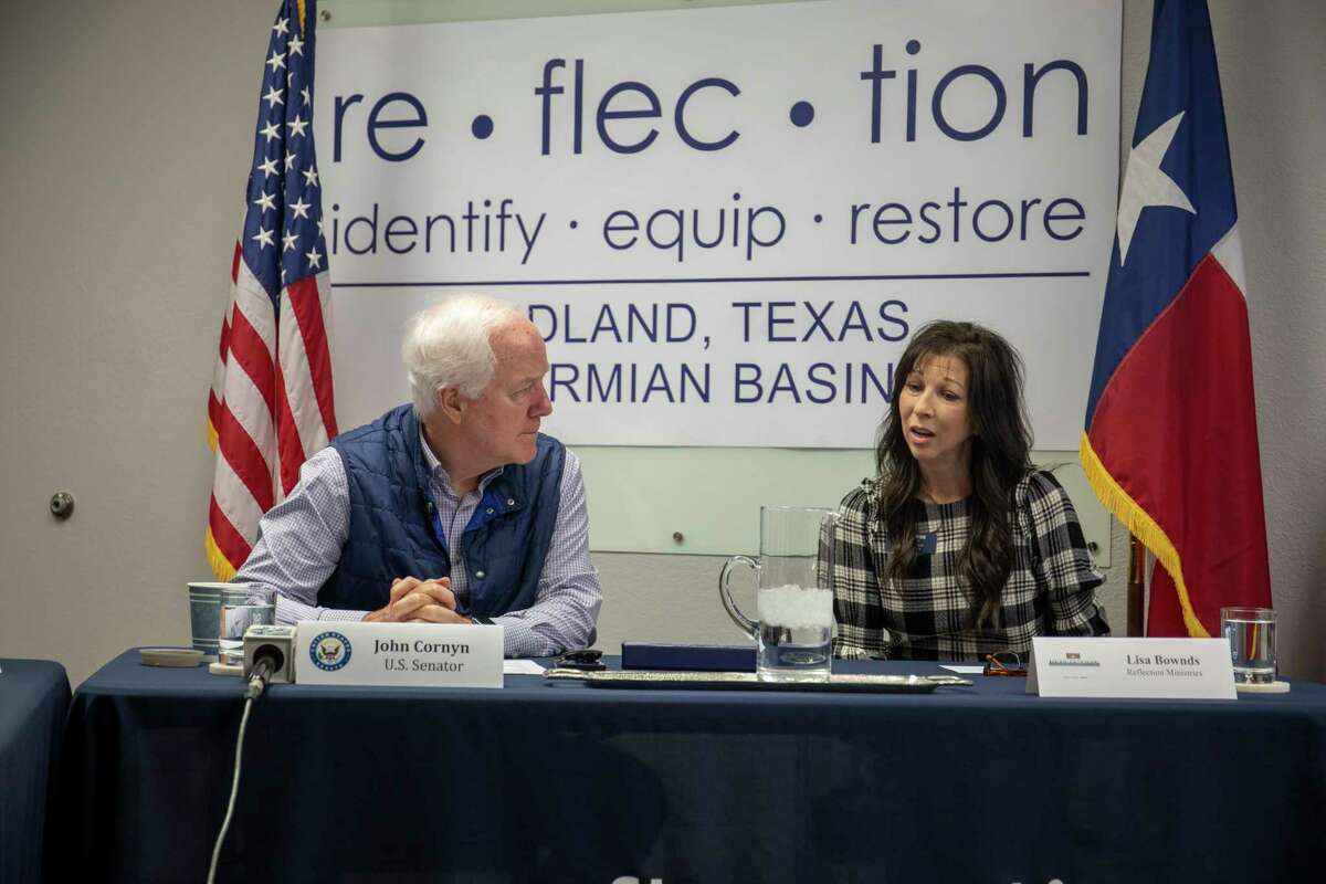U.S. Sen. John Cornyn visits with Reflection Ministries' Lisa Bownds about the Trafficking Victims Protection Act in February at Reflection Ministries. Reporter-Telegram