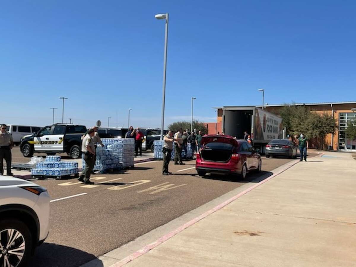 Members of the South Texas Bank unload packages of bottled water for Laredo residents impacted by a boil water notice on Feb. 22, 2022. The South Texas Food Bank will be holding other events on Wednesday, Feb. 23, 2022 at Nuestra Señora del Refugio Catholic Church from 9:30 a.m. until supplies last, and in the afternoon at the City of Laredo Health Department from 1:30 p.m. until supplies last.