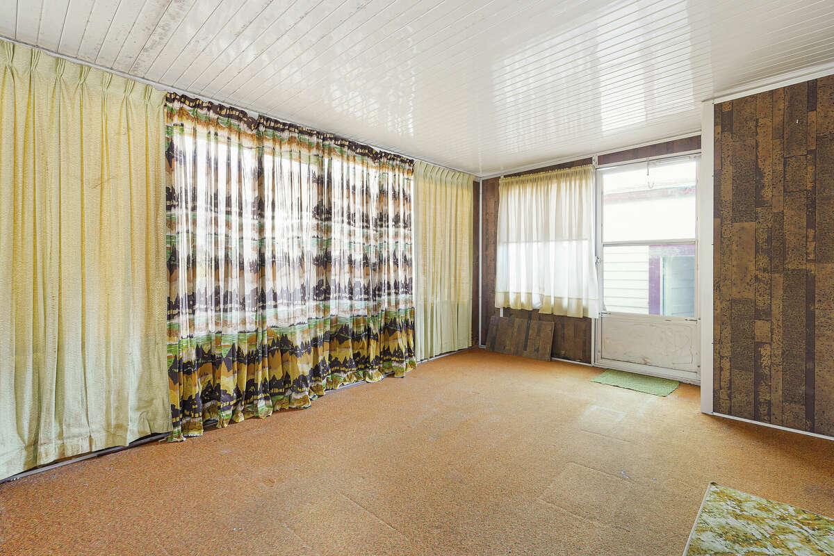 From the floors to the curtains, this is a rare time capsule of a home.