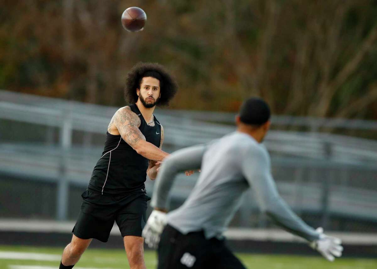Free agent quarterback Colin Kaepernick participates in a workout for NFL football scouts and media, Saturday, Nov. 16, 2019, in Riverdale, Ga. Kaepernick is still blackballed from the NFL four years after protesting racial injustice. In the ultimate hypocrisy, the league has taken up the cause that he championed but clearly has no intention of taking Kaepernick back. (AP Photo/Todd Kirkland)
