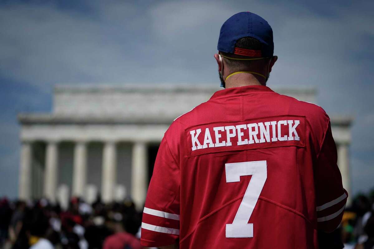 WASHINGTON, DC - AUGUST 28: A man wears a Colin Kaepernick jersey during the March on Washington at the Lincoln Memorial August 28, 2020 in Washington, DC. Today marks the 57th anniversary of Rev. Martin Luther King Jr.'s "I Have A Dream" speech at the same location. (Photo by Drew Angerer/Getty Images)