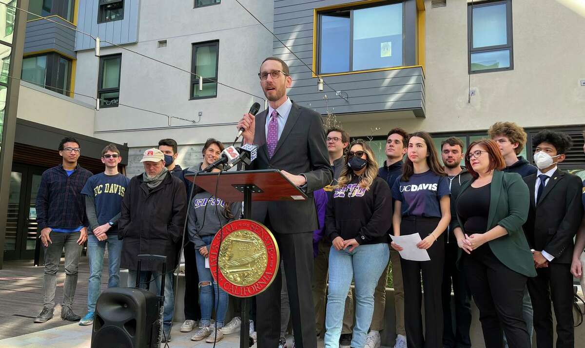 State Sen. Scott Wiener speaks at a press conference at San Francisco State University, unveiling legislation to exempt some housing projects at the state’s public colleges and universities from environmental review.