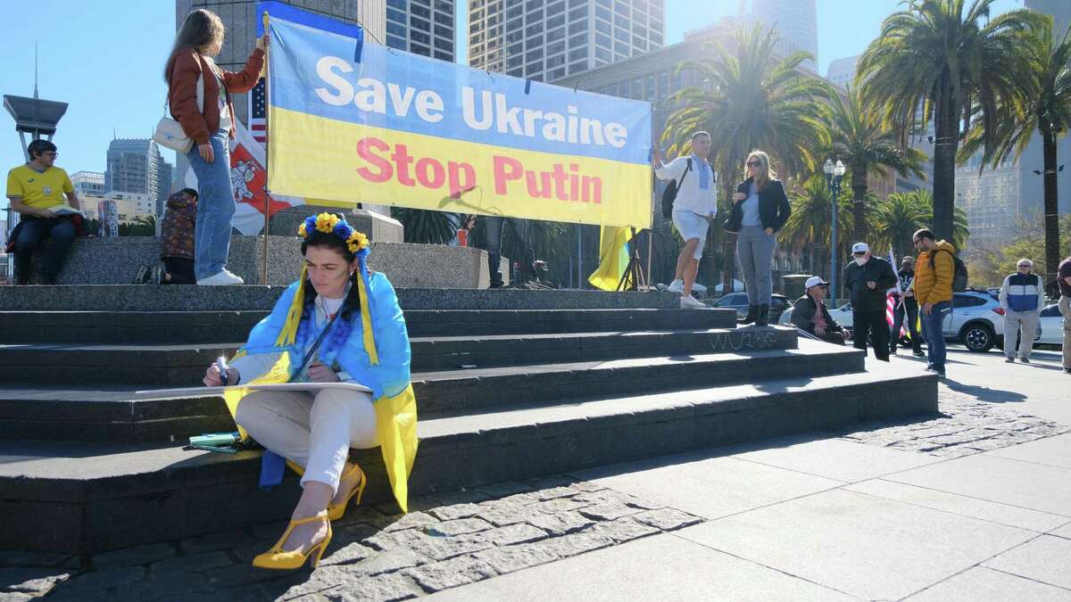 About 100 people gathered in front of the Ferry Building in San Francisco on Sunday to protest Russia’s moves to invade the Ukraine. The event was organized by a coalition of Ukrainian American organizations.