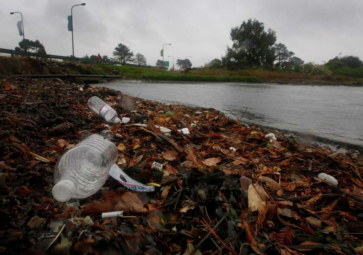 Trash accumulates on the shoreline of San Francisco Bay at the Berkeley Marina in 2009. Much of the trash flows through storm drains and winds up along the bay’s shore. Microplastics in the bay pose an increasing health risk to fish and marine mammals.