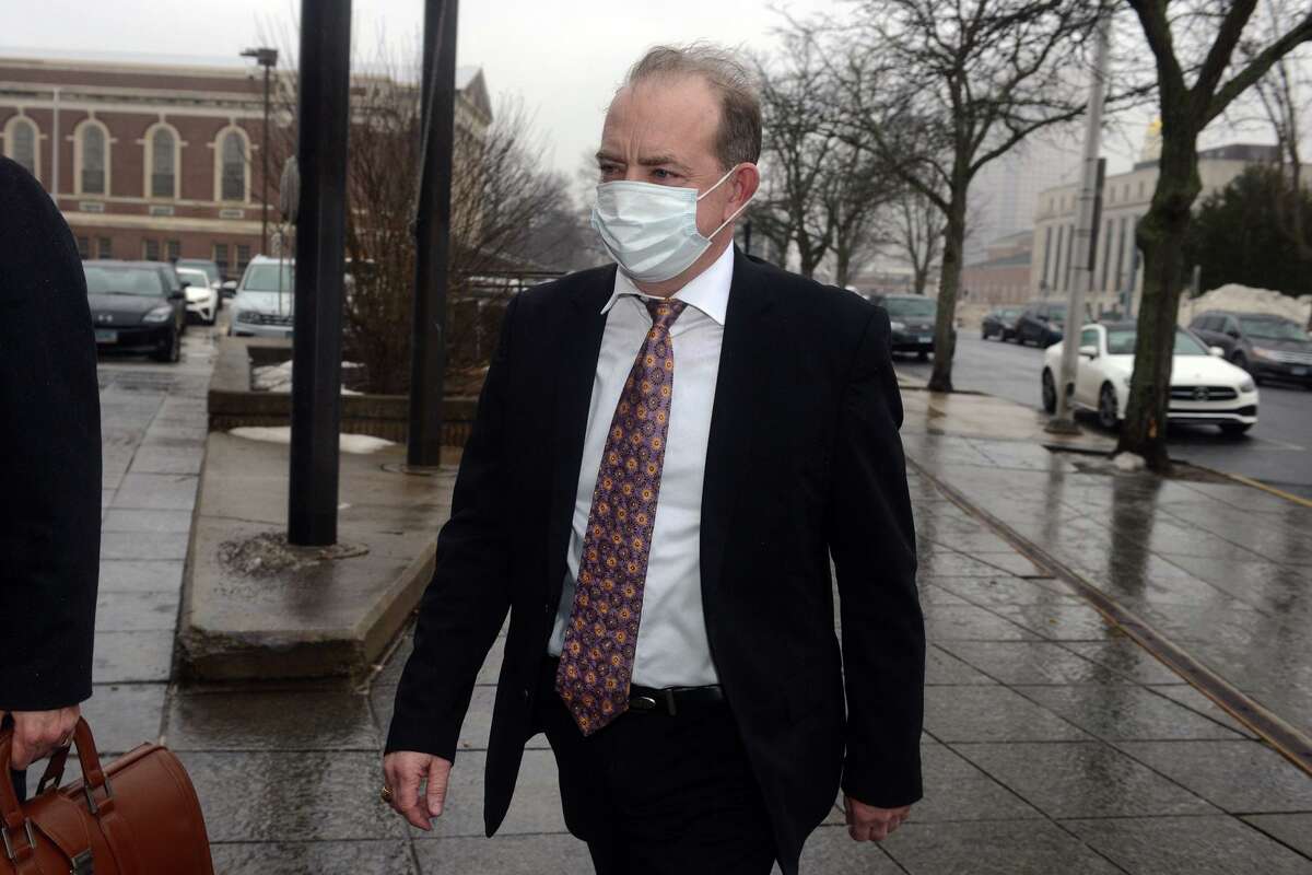 Kent Mawhinney enters Superior Court in Hartford, Conn. Feb. 3, 2022. Mawhinney was sentenced Friday to a suspended jail term and three years of probation in a domestic violence case involving his former wife.