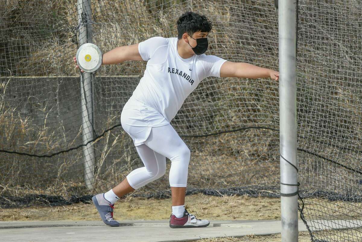 Alexander High School’s Julian Tijerina participates in the discus event, Thursday, March 4, 2021, during a track meet at the UISD Student Activity Complex.