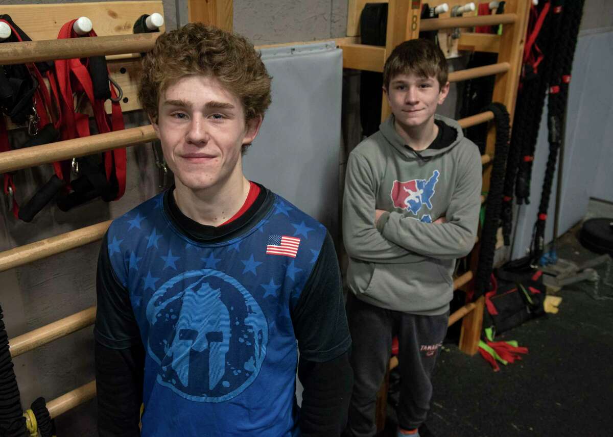 Tamarac wrestlers Torin Bishop, left, and Trevor Bishop at Curby Training Center on Wednesday, Feb. 23, 2022 in Troy, N.Y. The brothers are preparing for the state championships on Friday and Saturday.