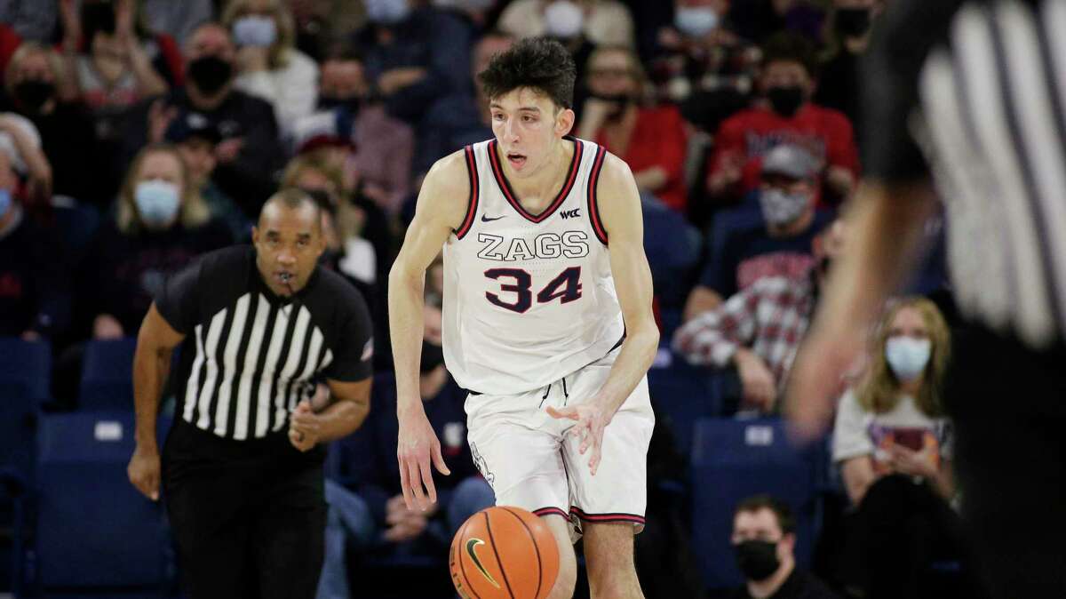 Gonzaga center Chet Holmgren controls the ball during the second half of an NCAA college basketball game against Santa Clara, Saturday, Feb. 19, 2022, in Spokane, Wash. (AP Photo/Young Kwak)