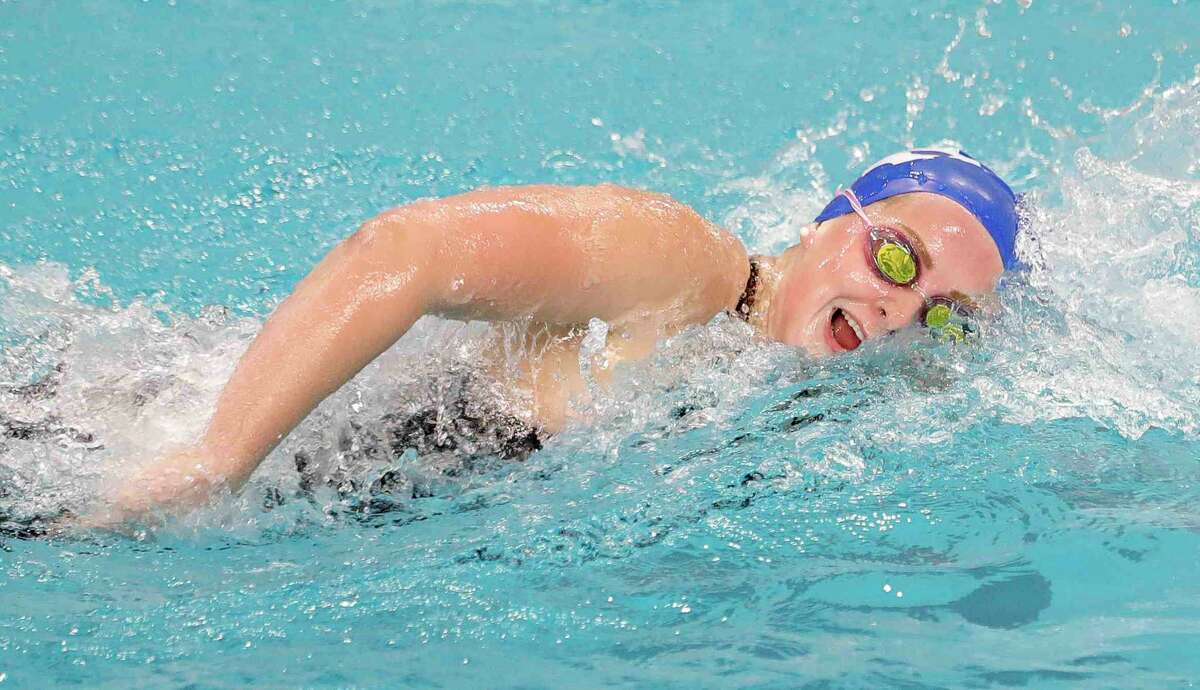 Hayden Miller competes in the Class 6A girls 500-yard freestyle during the UIL State Swimming and Diving Championships at Lee & Joe Jamail Texas Swimming Center, Saturday, Feb. 19, 2022, in Austin.