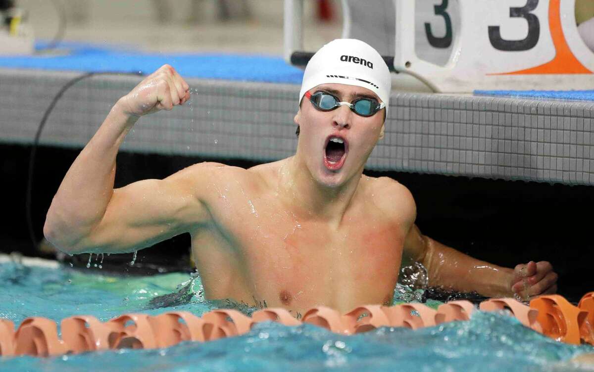 Benjamin Scholl of Cypress Woods reacts after winning the Class 6A boys 50-yard freestyle during the UIL State Swimming and Diving Championships at Lee & Joe Jamail Texas Swimming Center, Saturday, Feb. 19, 2022, in Austin.