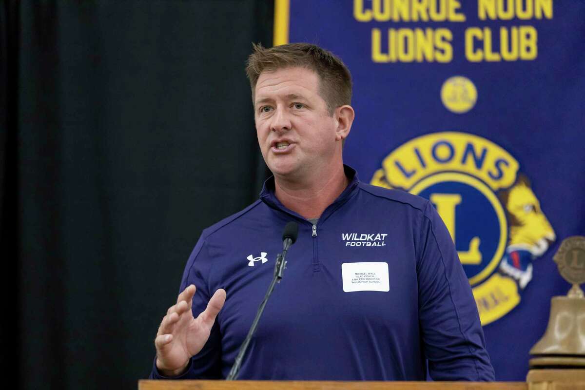 Willis High School head football coach Michael Wall speaks during the 45th annual Conroe Noon Lions Club Pigskin Preview at the Lone Star Convention Center, Wednesday, August 4, 2021, in Conroe.