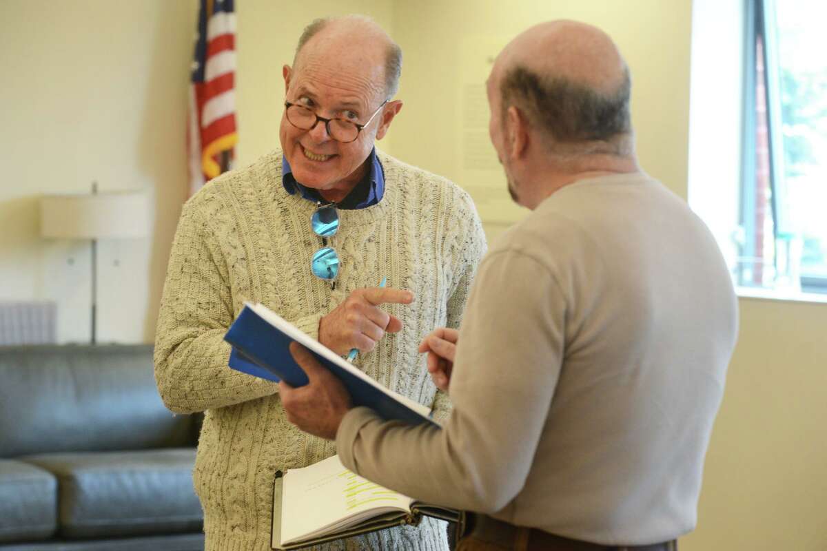 William Pender, left, and Jon Polayes rehearse for "My Millionaire: The Million Pound Bank Note" at the Westport Public Library Feb. 23, 2022.