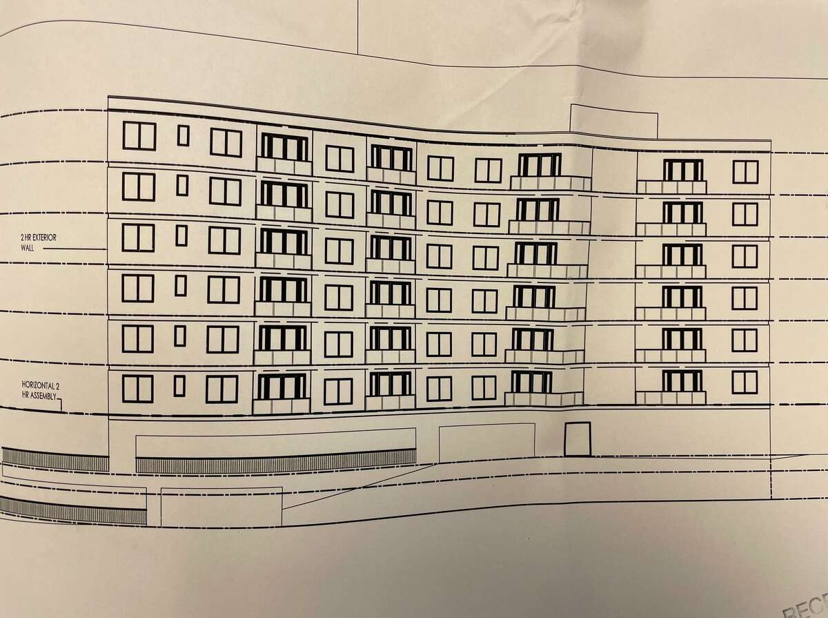A rough design sketch outlines plans for 60 residential units off Greenwich Avenue at West Elm Street.