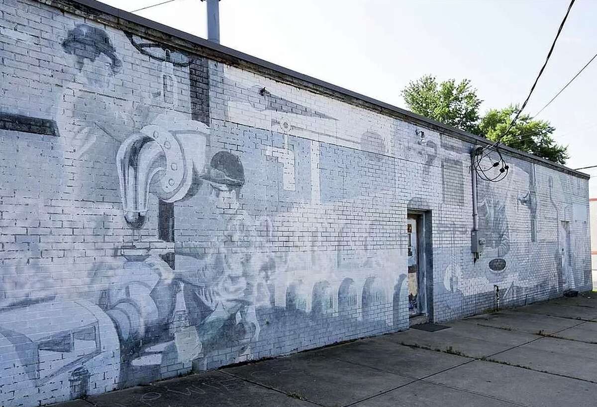 This week’s house at 328 Ontario St., Albany has a safe-house atmosphere. It’s the former Albany Plumbers Union, converted into a home. A mural painted in 1980 covers the exterior walls. There are no windows — natural light comes through skylights. The decor is industrial, including a Z-Box, which is a three-walled room within a room that contains the property’s one bed as well as closets, shelving and lighting. The kitchen has a diner-style booth and steel cabinets, painted red. The one bathroom, finished with a black porcelin sink and toilet, has a huge walk-in shower with multiple heads. The house has 1,700 square feet of living space. Taxes: $6,309. List price: $240,000. Contact listing agent Alex Monticello of Monticello Real Estate at 518-227-0718. An open house is planned for 1 to 3 p.m. Sunday. 