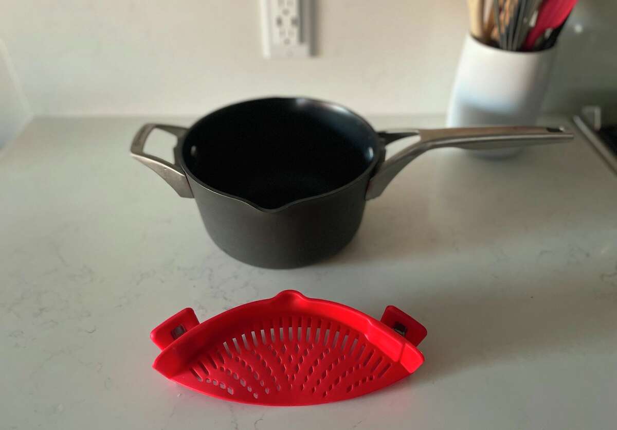 This clip-on strainer from  will be your new favorite kitchen gadget