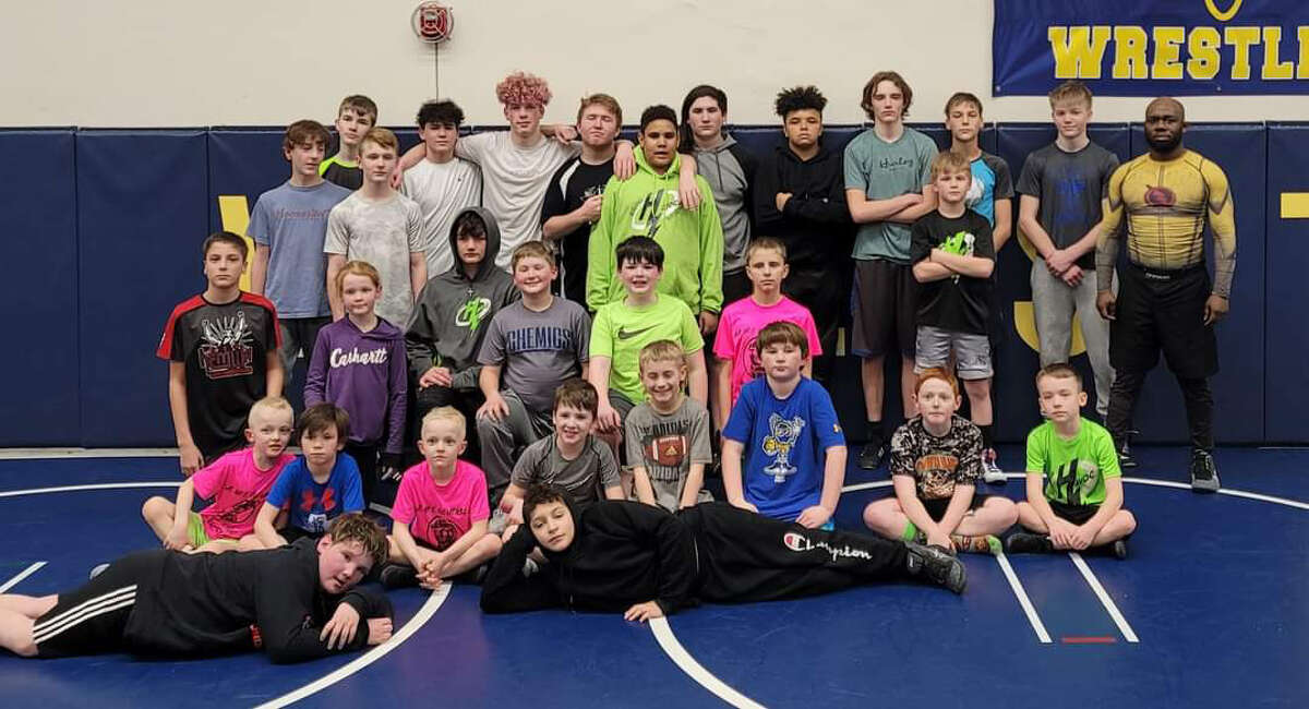 Members of the Midland Havoc youth wrestling team pose following last weekend's regional tournament.