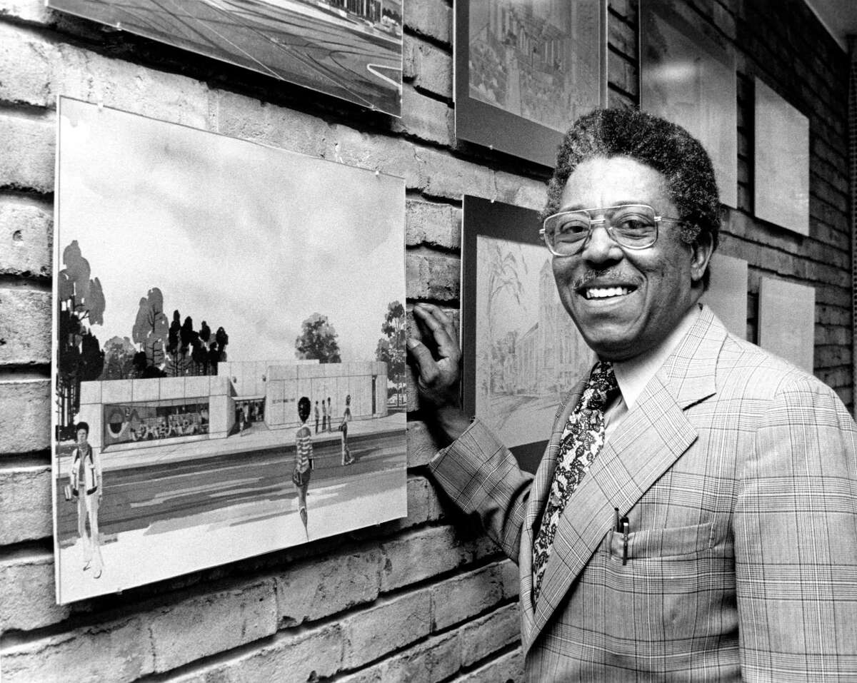 Architect John S. Chase with rendering of one of his buildings on the wall of his offices at 1201 Southmore in 1976.