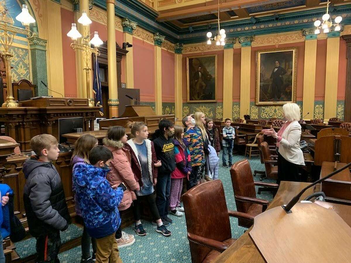 Rep. Annette Glenn welcomed three classes from Pine River Elementary of Bullock Creek Public Schools on Thursday, Feb. 24, 2022 in Lansing. Rep. Glenn is pictured with a class on the floor of the Michigan House of Representatives.  