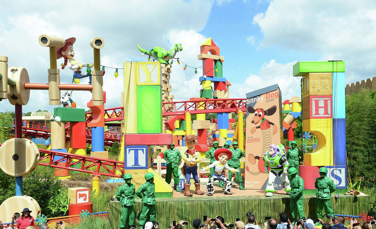 "Toy Story" characters pose during the Toy Story Land grand opening at Disney's Hollywood Studios on June 29, 2018, in Orlando, Fla.