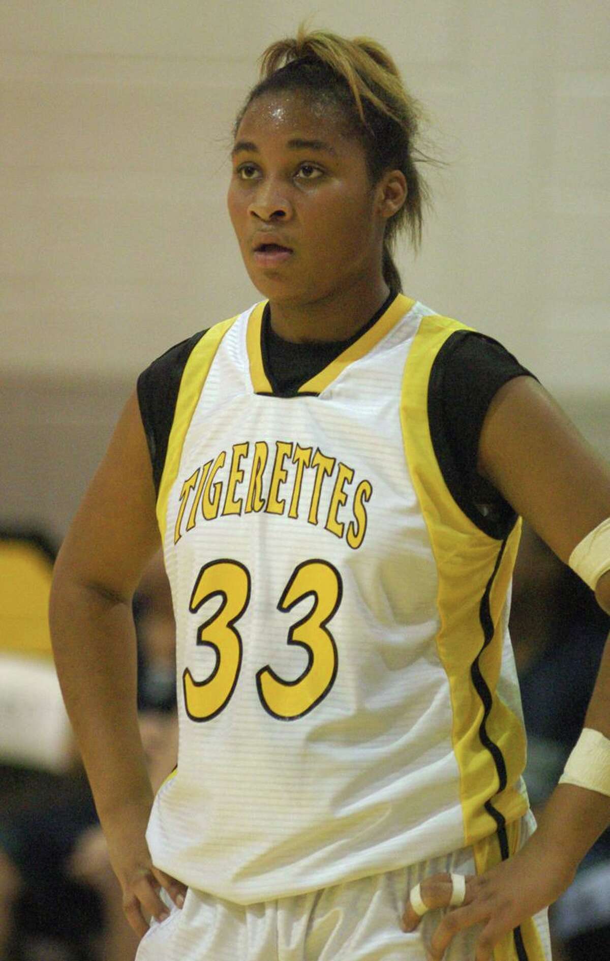 Conroe's Chanistie Smith, #33, waits for game to start. Teams playing in the Conroe's 58th Annual Varsity Girls Basketball Tournament.