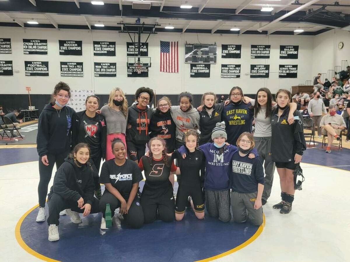The Southern Connecticut Conference saw a rise in the number of female participants at its championship event. Sixteen of the female competitors are pictured during the event held Feb. 5.