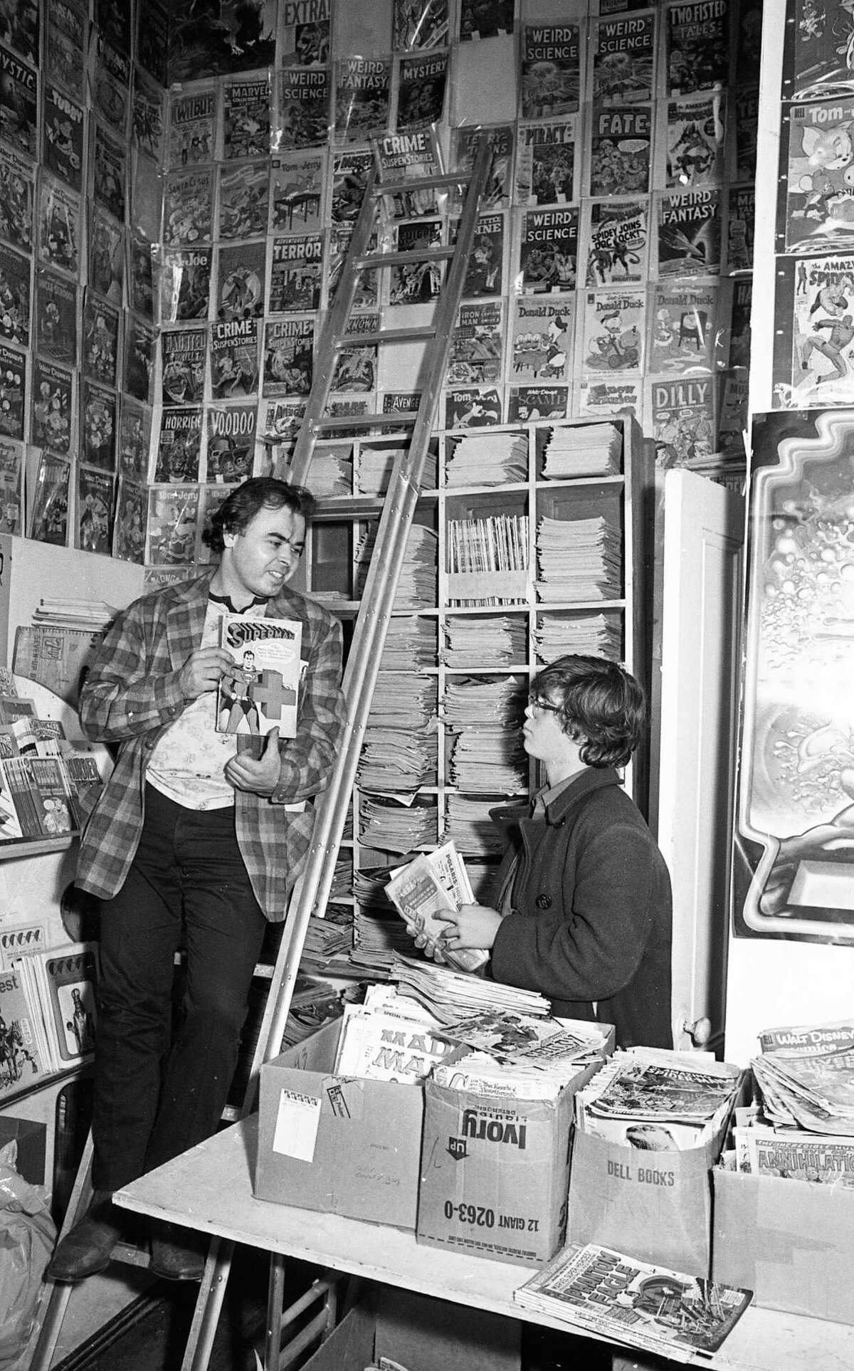 November 17, 1971: Gary Arlington, left, talks to a customer at the San Francisco Comic Book Company in 1971.