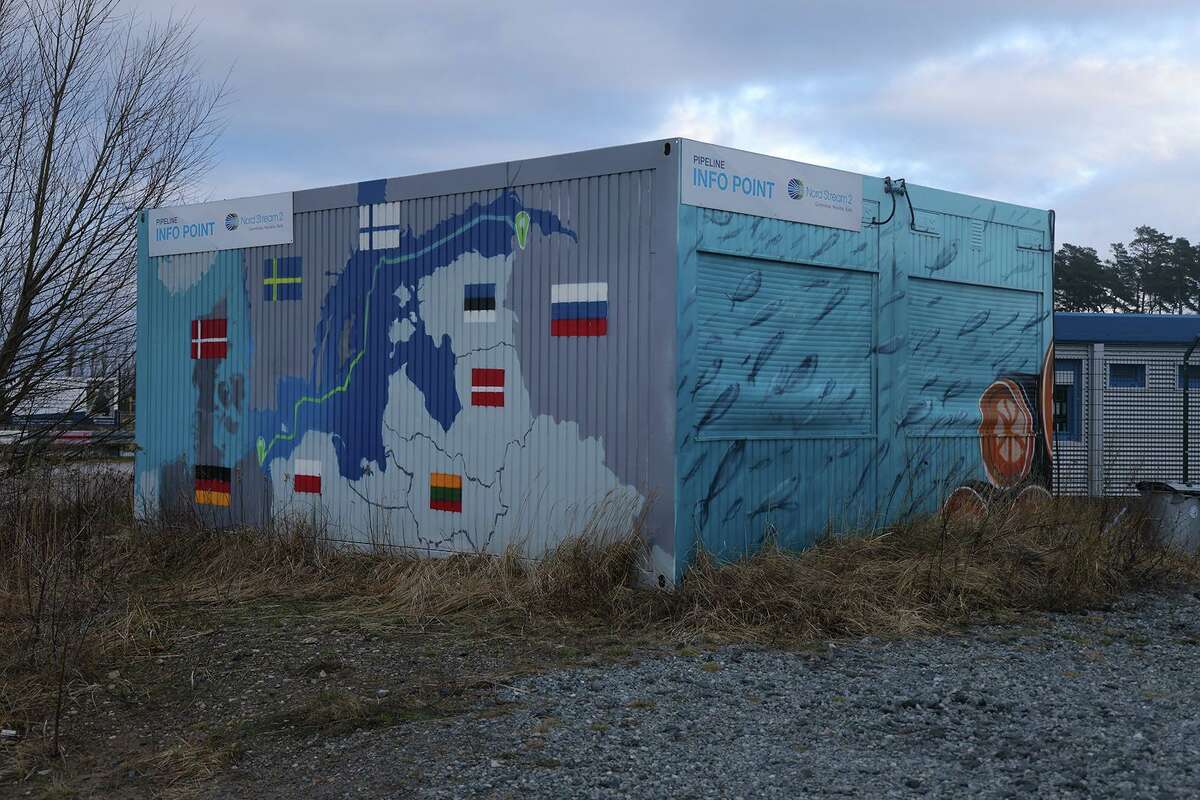 A map shows the course of the Nord Stream 2 gas pipeline from Russia to Germany on the exterior of an informational booth close to the receiving station for Nord Stream 2. Germany has blocked approval of the pipeline, creating opportunities for U.S. LNG.