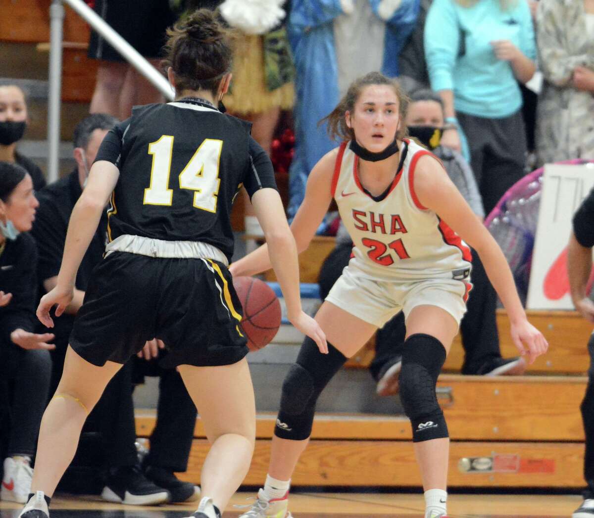 Rosa Rizzitelli of SHA is guarded by Brooke Salutari of Hand during the SCC girls basketball championship on Wednesday, Feb. 23, 2022. Rizzitelli was a Class M co-champion in girls soccer.
