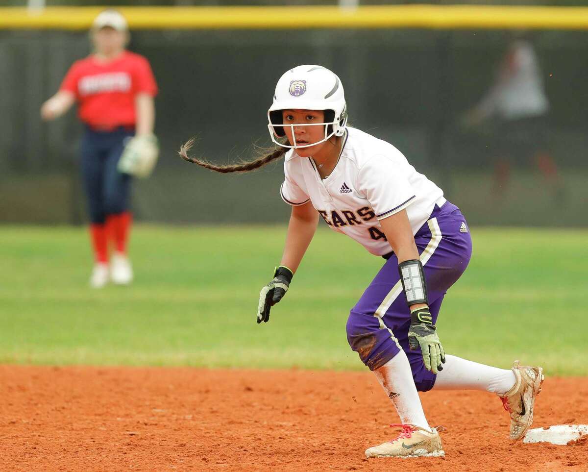 Alayna Galloway #4 of Montgomery looks to advance to third base during a high school softball game against Atascocita, Thursday, Feb. 24, 2022, in Oak Ridge.