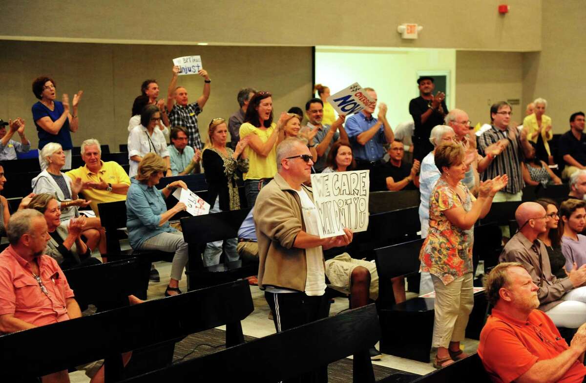 Residents and supporters voice displeasure with taxes at a 2016 meeting of the Bridgeport City Council in Bridgeport, Conn. The city’s grand list increased 23 percent in 2020 after Bridgeport’s most recent revaluation, with appeals on individual property assessments to get hearings in March 2022.