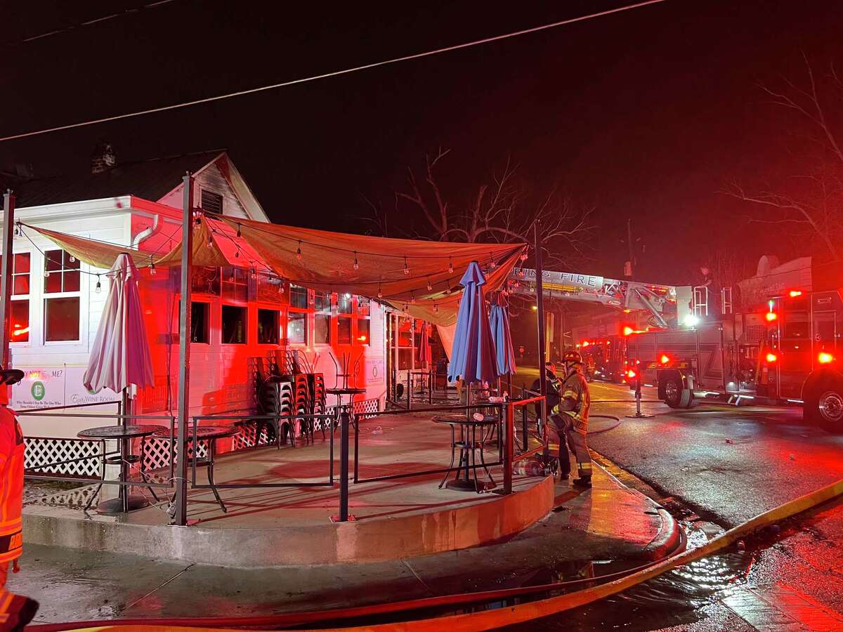 Spring firefighters respond to a fire at Envy Wine Bar in Old Town Spring Sunday night.