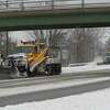 Snowplows clear the snow off Western Ave. during a snow storm on Friday Feb. 25, 2022 in Guilderland, N.Y.