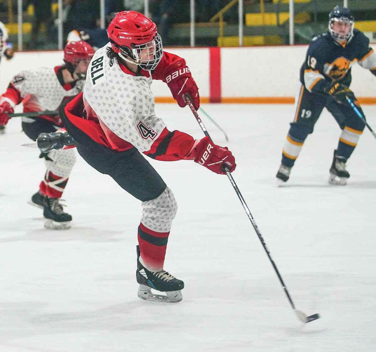 Alton's Lawson Bell scored a pair of goals, including one in regulation and one in an overtime shootout, in the Redbirds' 2-1 win over Highland in Game 1 of the MVCHA Class 1A finals.