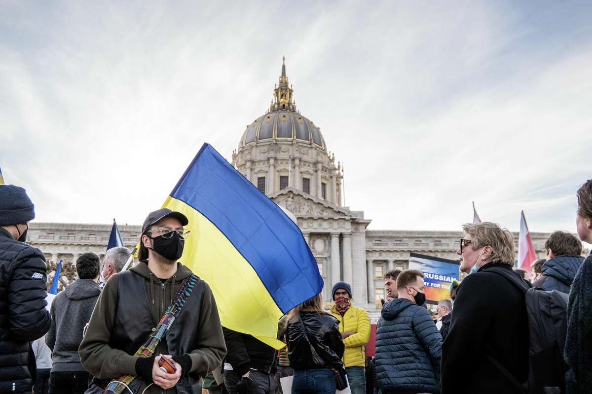 Bay area residents gather to protest Russia's invasion of Ukraine at San Francisco's City Hall on Thursday, February 24, 2022.