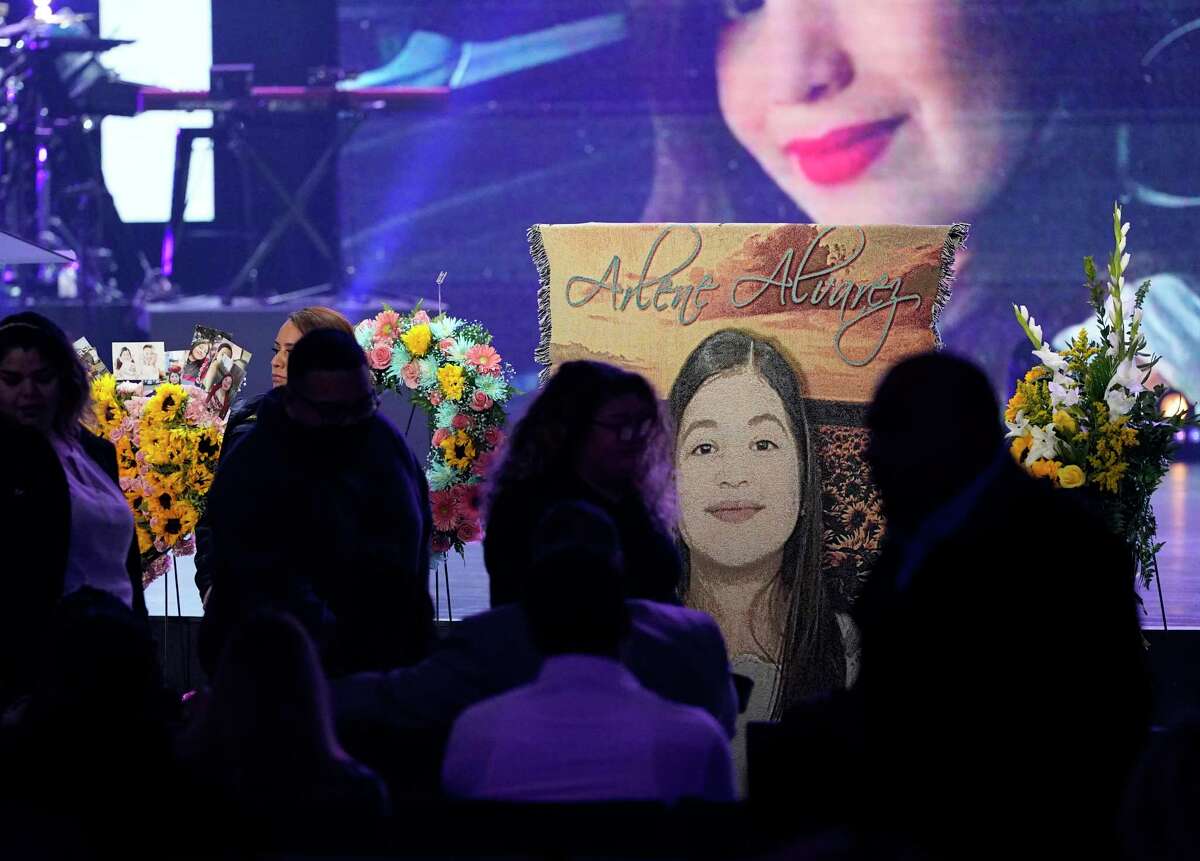 People attend the public visitation before the funeral for Arlene Álvarez, 9, at Grace Church, 14505 Gulf Fwy., Friday, Feb. 25, 2022, in Houston. Tony D. Earls has been charged in connection to her death. He was robbed at an ATM and fired at the robbery suspect. She was shot as her family drove by.