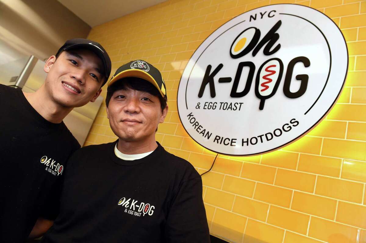 Owners Sen Lin, left, and Kenny Kim in the recently opened Oh K-Dog & Egg Toast on College Street in New Haven Feb. 25, 2022.