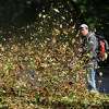 A landscaper uses a blower to clear leaves from a yard on Mead Avenue in Byram in October 2018. A new effort is underway in town to restrict gas-powered leaf blowers. Short- and long-term goals will be determined as more information is presented to the Board of Selectmen.