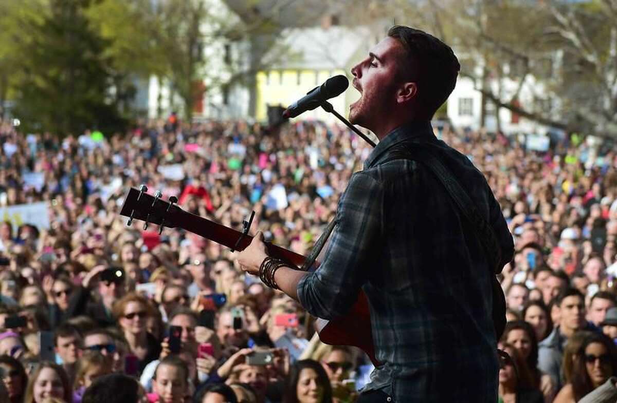 "(Peter Hvizdak - New Haven Register)American Idol's Nick Fradiani of Guilford, performs a concert on the Guilford Green after a welcome home parade on Whitfield Street in Guilford, Connecticut Friday, May 1, 2015."